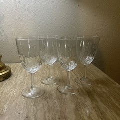 Set of four Luminarc fluted crystal wine glasses, stamped ‘France’.
