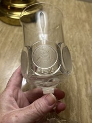 Decorative glass goblet with applied United States themed medallions.