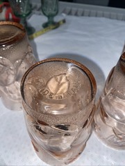 Set of 4 pink juice glasses (4-3/4”h) with fruit motif. Made in Italy