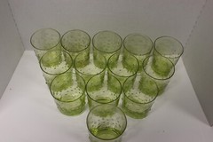 Set of 13 oval, green bubbled glass drinking glasses, 12 fluid oz capacity