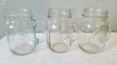 Two Clear Glass Golden Harvest and One Ball Pint Sized Handled Drinking Jars