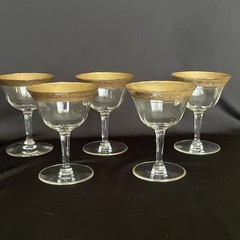 Tiffin-Franciscan clear optic crystal with a gold-encrusted band rim. Set