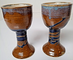 Pair signed Schaefer studio pottery goblets, brown blue, medium size