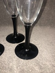 CHAMPAGNE FLUTES BLACK STEM CLEAR BOWL – 7-3/4″ HEIGHT SET OF 4