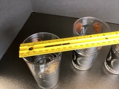 Set of four vintage Continental Can company coin glasses
