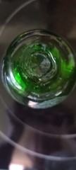 N.W. Hand Blown Green Glass, Etched With Pine cones.