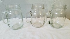 Two Clear Glass Golden Harvest and One Ball Pint Sized Handled Drinking Jars