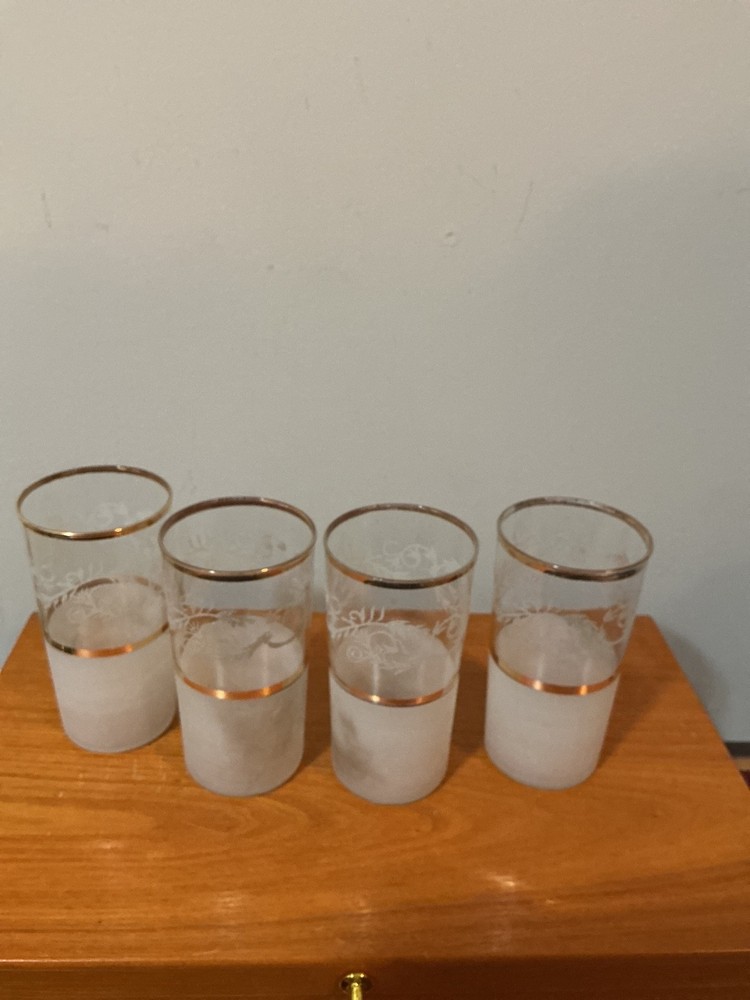vintage frosted tumblers featuring a gold rim and an embossed vine or fruit