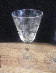 TWO VINTAGE CORDIAL GLASSES..BEVELED GLASS AND ETCHED FLOWERS..SHERRY CORDIALS