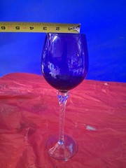 This is a vintage cobalt blue and clear twisted stem wine glass