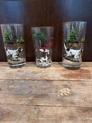 are vintage mid-century hunting scene tumbler glasses, most likely manufactured