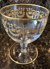 Set Of 4 Baccarat crystal gilded water goblet in the Flora pattern. Signed