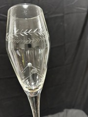 vintage Pair champagne flutes featuring an etched design