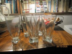 5 tall crystal tumblers with bullets and triangle bottoms, not Moretti