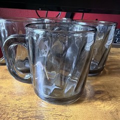 This vintage glassware collection includes 4 Libbey Smoky Gray Swirl Optic Mugs