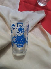 vintage Kraft «Swanky Swig» juice glass from the 1950s featuring a blue…