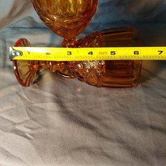 Amber colored glass pedestal goblets, Pair