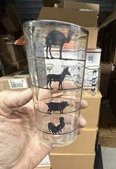five glass tumblers with silver overlay animals
