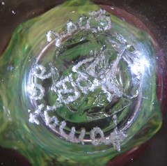 Hand Blown Art Glass Goblet Red with Green Leaves on base 2003 signed 8″ High