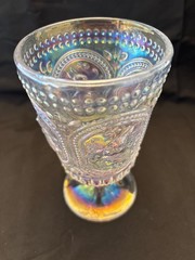 Beautiful iridized clear glass goblet with a bunny rabbit theme. 6 inches tall.