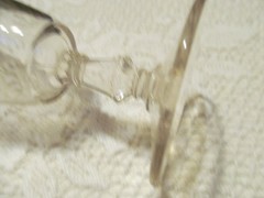 FLINT GLASS STEMED OLD GLASS LILLY OF THE VALLEY ETCHED ON IT.GLASS BEADS BOTTOM