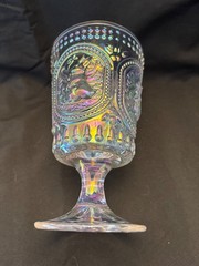 Beautiful iridized clear glass goblet with a bunny rabbit theme. 6 inches tall.