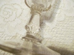 FLINT GLASS STEMED OLD GLASS LILLY OF THE VALLEY ETCHED ON IT.GLASS BEADS BOTTOM