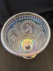 Beautiful iridized clear glass goblet with a bunny rabbit theme. 6 inches tall.