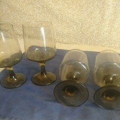 Vintage Smoky Stemed Glasses set of 4. 6inches tall 3inches across the top