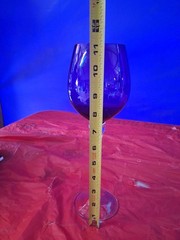 This is a vintage cobalt blue and clear twisted stem wine glass
