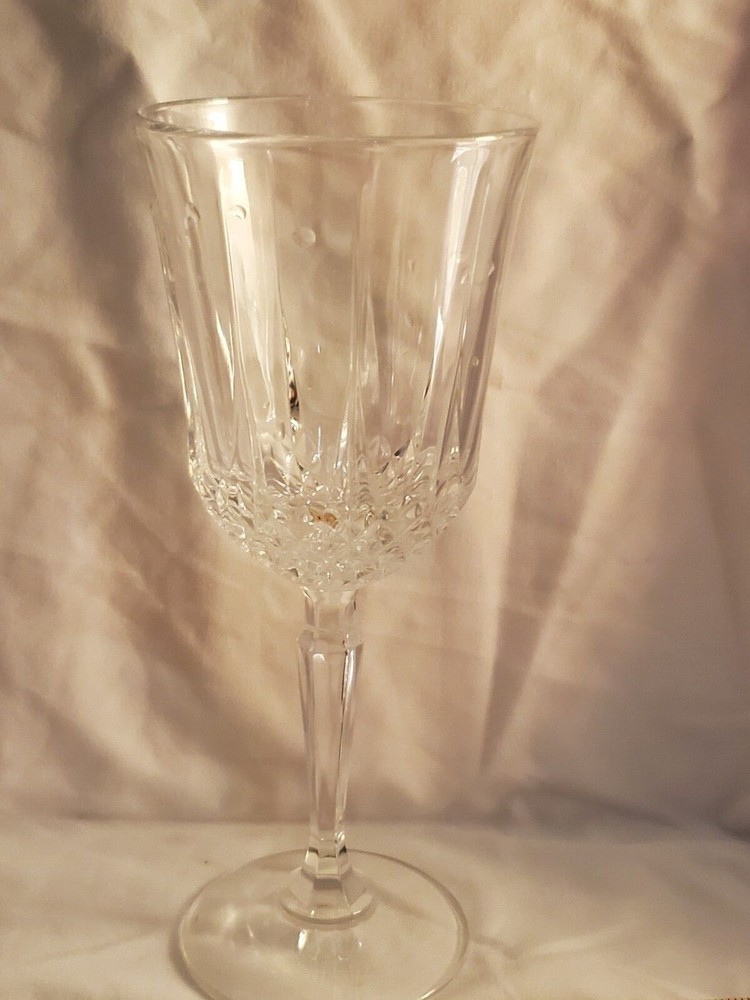 Vintage Crystal Glassware holds 10 ounces of liquid. The glass is 8 inches tall