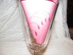 FLINT GLASS STEMED OLD GLASS LILLY OF THE VALLEY ETCHED ON IT.GLASS BEADS BOTTOM