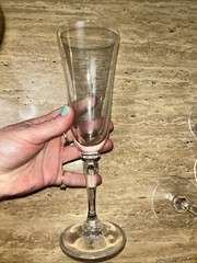 Set of 4 Mikasa Wheaton Like glass fluted champagne flutes with twisted stems.