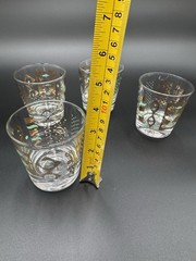 4 Glasses 3 1/2 Inches Tall With gold And green Accents