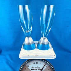 Nambe TILT two Champagne Flutes 7.5” Heavy Base Tilts Hard to Find Tiny Chip