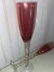 Two 11.5” Tall Burgundy With Clear Decorative Stem Champagne Glasses