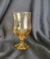Anchor Hocking Tulip Shape Goblet Glass. Amber yellow. Approx 5.75″.