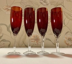 Set of Four (4) Red 9″ Champagne Wine Flutes with Clear Affixed Tulip Stems