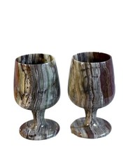 A pair of beautiful old wine glasses, made of heavy reddish marble. height: 17