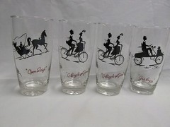 Swanky Swig set of 4 Glasses 16 OZ Silhouette Sleigh Bicycle Motor Car Glasses