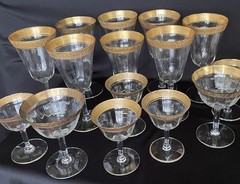 Tiffin-Franciscan clear optic crystal with a gold-encrusted band rim. Set
