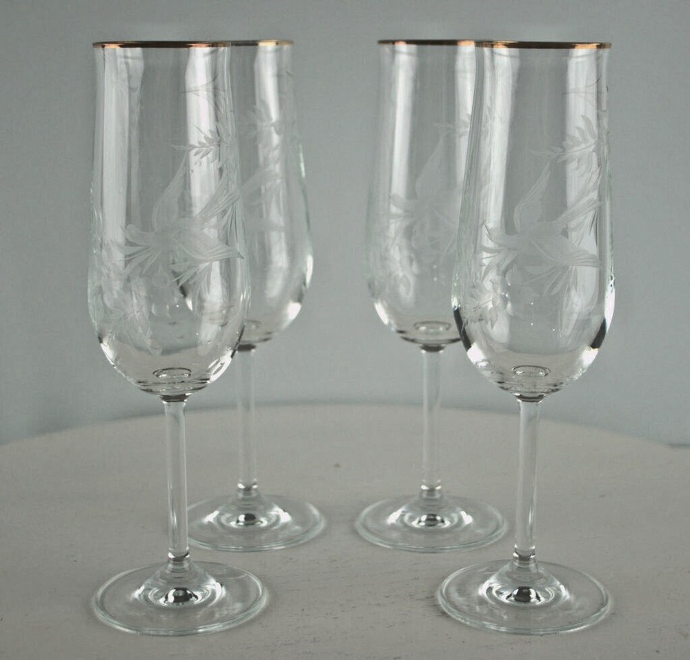 Set of four champagne flutes with a hand carved design Bird & Flowers Beautiful