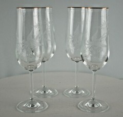 Set of four champagne flutes with a hand carved design Bird & Flowers Beautiful