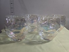 Set of 4 clear irridescent tumbler glasses.3.5″tall 3 5″w.