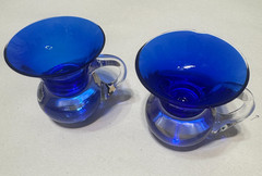Pair of Vintage Cobalt Blue Art Glass Mugs Clear Handle Tiny Mini Pitchers Cups