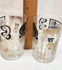 Vintage set of 4 Roman Egyptian Design Gold And Black Juice Glasses Heavy Base